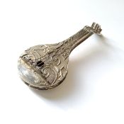 A Dutch 934 silver miniature of a Cittern, embossed in relief decoration with scrolls & foliage to