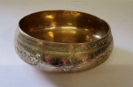 An Eastern bronze ceremonial singing prayer bowl, chased throughout.