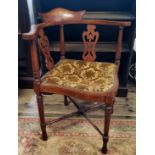 An Edwardian Sheraton Revival corner chair, X-frame stretcher c.1910