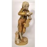 A large Royal Worcester figure, The Violinist/The Young Mozart, possibly modelled by Thomas Brock,