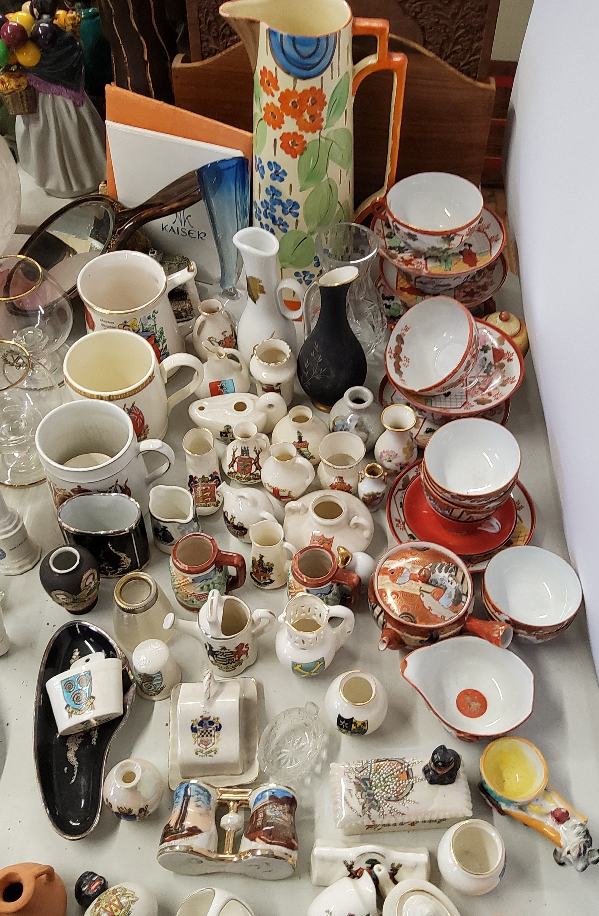 A quantity of novelty crested ware trinkets, commemorative ware, Satsuma tea service, etc