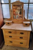 An early 20th century farmhouse pine dressing chest, oversized pressed copper escutcheons c.1910