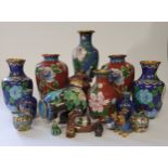 Seventeen Chinese or Cantonese cloisonné enamel examples, including vases, birds models, apple