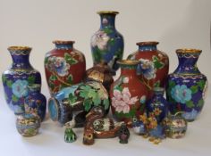 Seventeen Chinese or Cantonese cloisonné enamel examples, including vases, birds models, apple