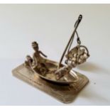A Dutch silver miniature of a fishing boat with catch and two fishermen, TP?, 1814-1906 sword