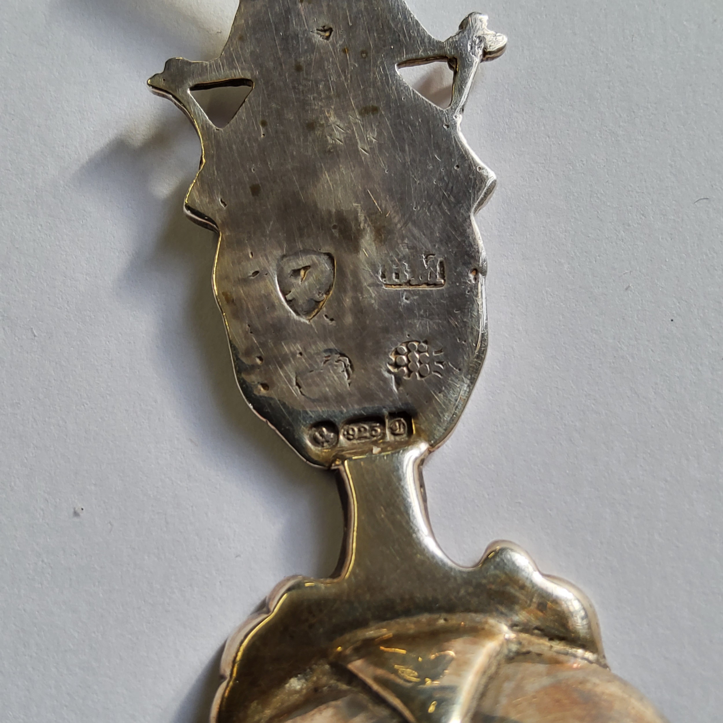 A Dutch silver wet fruit/sifter spoon, the bowl chased, engraved & embossed in relief typical - Image 3 of 4