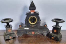 A substantial 19th Century French Belge noir mantel clock and garnitures