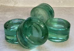 Four Victorian R.R Thomas (inventor) Kidsgrove green glass piano insulators