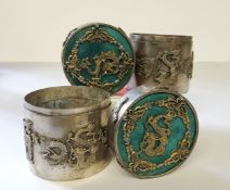 A pair of early 20th century Chinese green stone inset tea canisters, the lid decorated with a