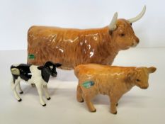 Beswick Highland bull & calf; a Beswick Fresian calf (3)