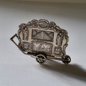 A Dutch silver miniature of a Carl Frei "De Klok" Dutch Street Organ, stamped with XXX & sword mark,