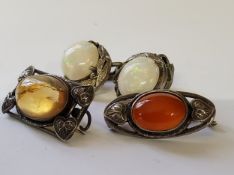 White Ridge opal earrings and brooches