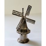 A Dutch silver miniature of Dutch tower windmill, stamped J▾DH, 1906-53 sword mark 10.61g
