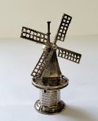 A Dutch silver miniature of Dutch tower windmill, stamped J▾DH, 1906-53 sword mark 10.61g