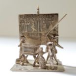 A Dutch silver miniature of a classroom, the teacher telling the story of the 'Lady of Stavoren', J.