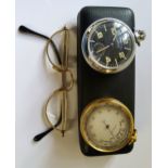 A gilt metal pocket barometer c.1920s; a Ingersoll stainless steel military style pocket watch,