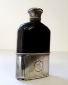 A Victorian silver, leather and glass hipflask, the removalable silver beaker, machined