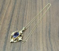 An Edwardian yellow metal pendant, set with a central oval amethyst stone, 9ct gold necklace 4.42g