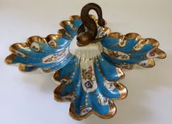 A large Sevres style porcelain scalloped entree dish or centrepiece mounted with a gilt metal