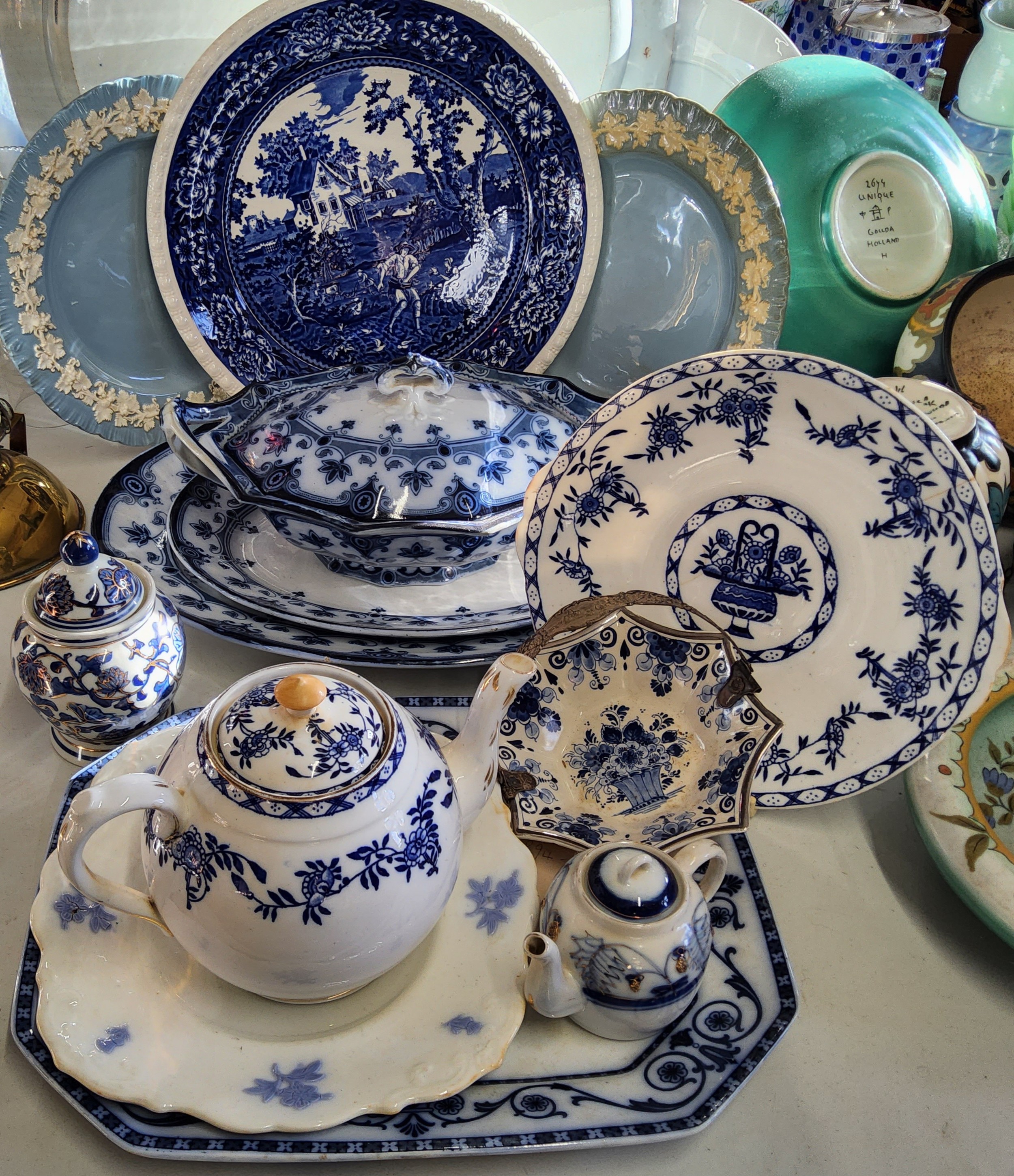 Blue & white including a teapot & sandwich plate possibly Delinières & Cie, marked D & C L, c1900;