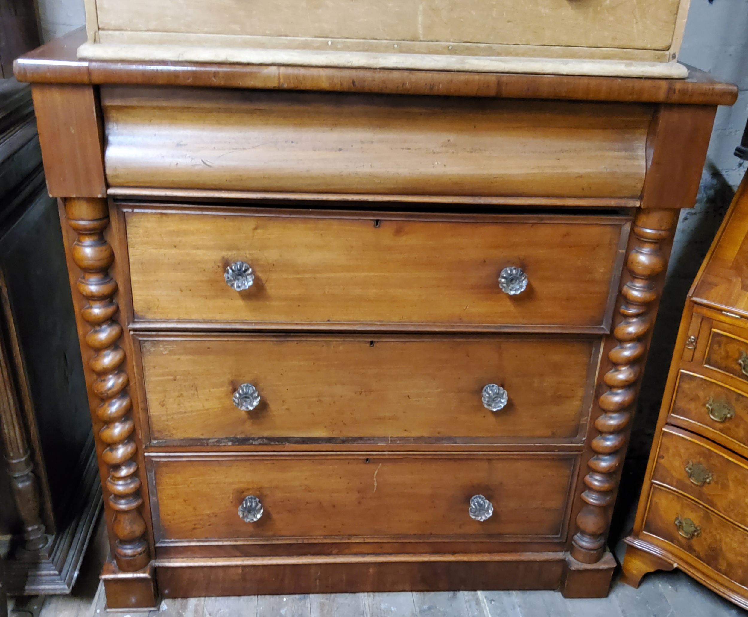 A Victorian mahogany Scottish chest of one hidden and three long graduated drawers, period glass