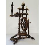 A German miniature turned beech and bone spinning wheel, late 19th c, peddle inscribed Strasbourg,