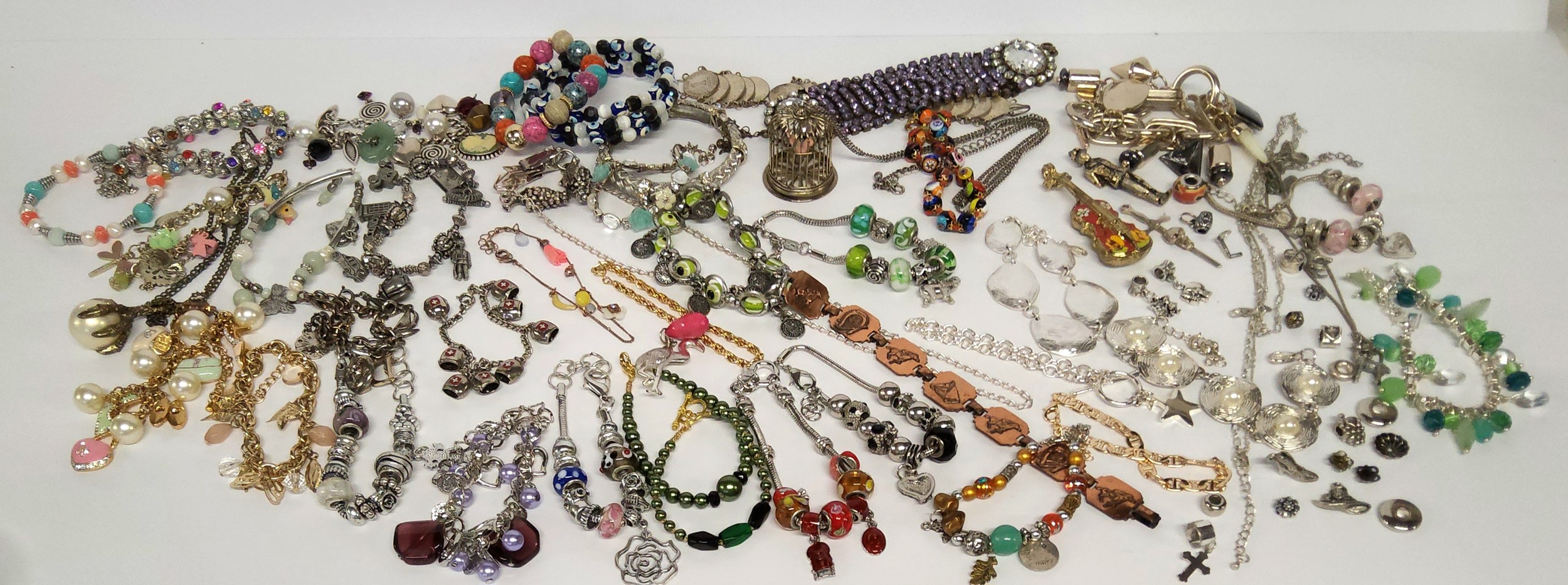 Costume jewellery including various charm bracelets, some Pandora style; necklaces including a