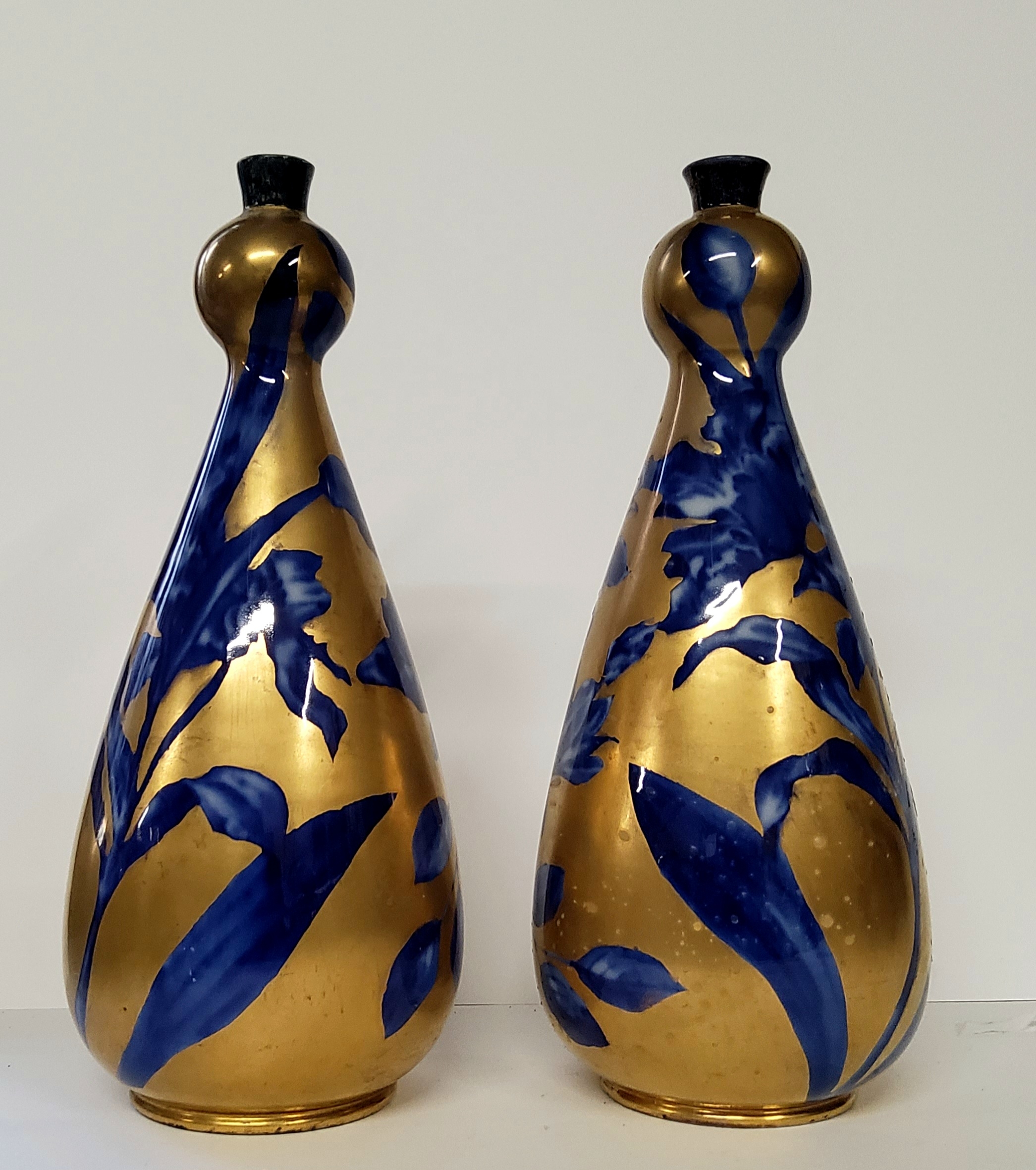 A pair of Thomas Forester & Sons of Longton bud vases,  marks to base.