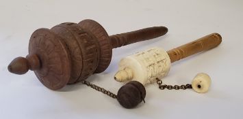 Two Tibetan Qing Dynasty temple prayer wheels including a carved bone and carved wood example c.