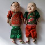 Two early 20th century Chinese puppets / dolls dressed in traditional silk clothing, papier mache.