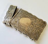 An Edwardian silver card case, chased & engraved with swags & flowers, vacant cartouche, **Ltd,