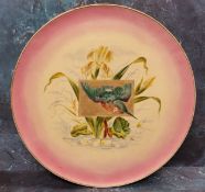 A Victorian Staffordshire pottery charger, painted by T. Fuglestad, signed, with kingfisher and