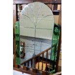 A substantial Art Deco arch shaped mirror, emerald green glass panels to sides, c.1930
