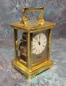 A brass striking carriage clock, 11 jewel movement, bevelled glass and small top panel,white dial