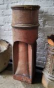 A Victorian salt glazed chimney pot