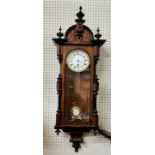 A 19th century walnut and ebony Vienna clock c.1880