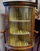 A small mahogany and gilt metal mounted bow front corner cupboard, excellent condition.