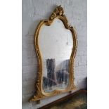 A substantial giltwood over mantel mirror