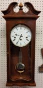 A walnut 8 day Comitti Westminster chime Wall regulator clock, NOS, original box & papers
