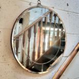 An Art Deco circular looking glass,  with sorcerer's mirror type,  convex inclusions to panelled