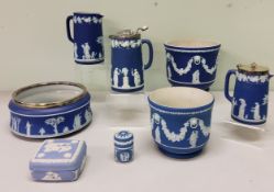 A Wedgwood blue Jasperware jardinière, 17cm wide, impressed mark;  other Wedgwood jugs, bowls, etc