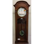A Hermle Regulator Wall Clock, mahogany finish, 8 Day Movement 4/4 Westminister chime, NO weights,