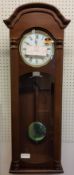 A Hermle Regulator Wall Clock, mahogany finish, 8 Day Movement 4/4 Westminister chime, NO weights,