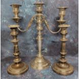 An E.P.N.S.  two-branch, three light candelabra, 38cm high; a a pair of EP on Copper table