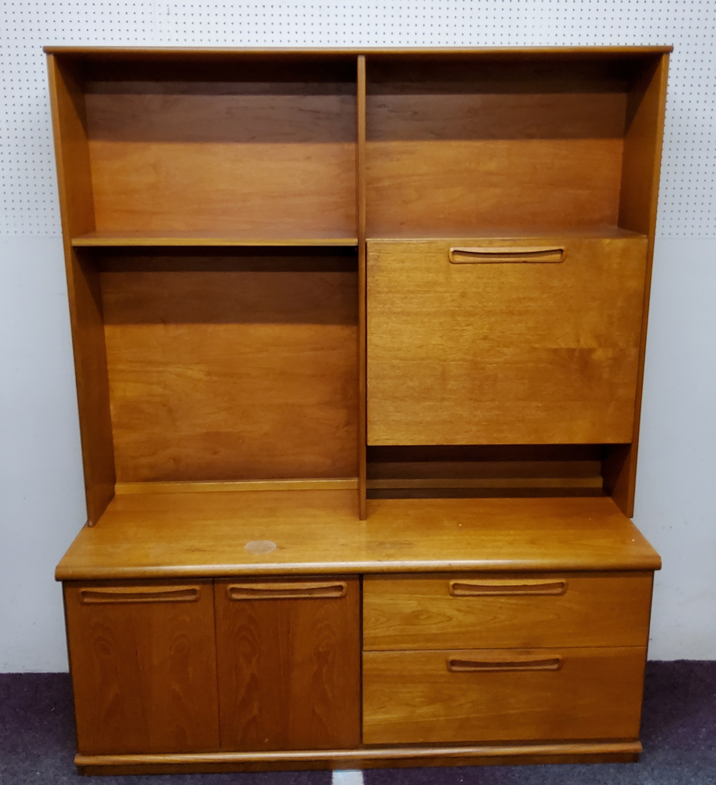 A Mid 20th century teak sideboard unit.