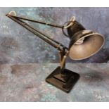 An early Herbert Terry Anglepoise lamp, in black, weighted plinth base