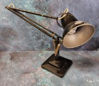 An early Herbert Terry Anglepoise lamp, in black, weighted plinth base