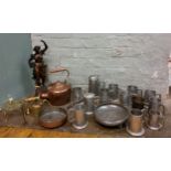 A Victorian copper kettle;  a  copper pan, steel handle;  brass trivet;   pewter mugs and
