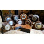 Twelve early 20th century oak, walnut and mahogany mantel clocks (for restoration)