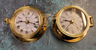 A Solent solid brass porthole clock, screw down hinged cover, quartz movement; another (2)